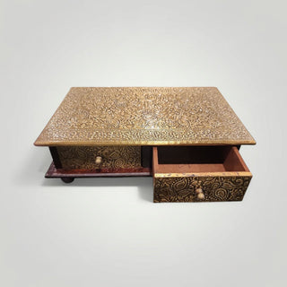Brass fitted chowki with drawers.