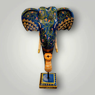 Wooden blue elephant trunk on stand